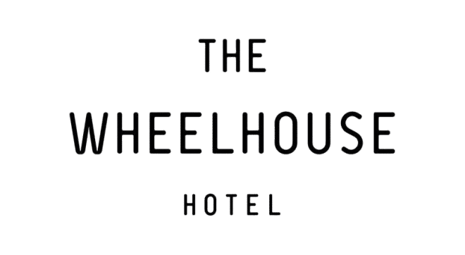 Black text on a white background reads "The Wheelhouse Hotel" in uppercase, minimalist font.